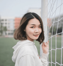 Portrait of a woman smiling with long hair